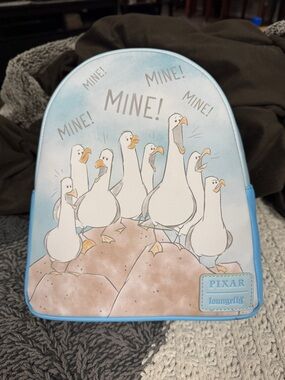 Loungefly Light Blue Pixar Seagulls "MINE!" Mini Backpack